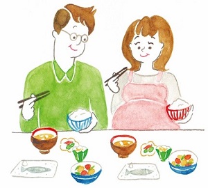 イラスト：食事をする夫と妊婦